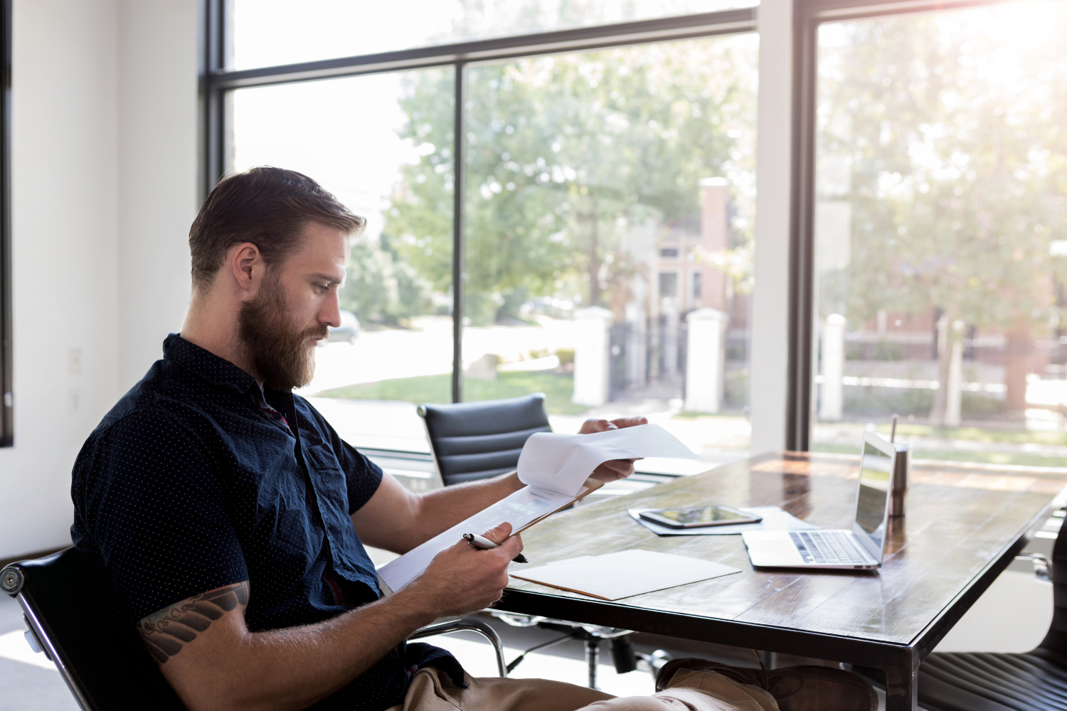Businessman reviewing paperwork.