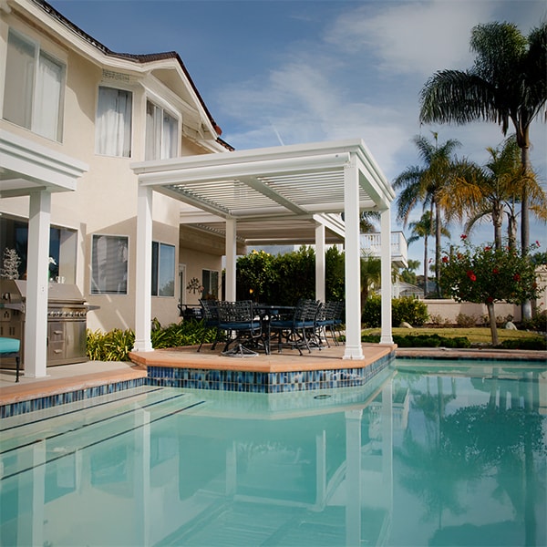 Poolside pergolas provide perfect protection.
