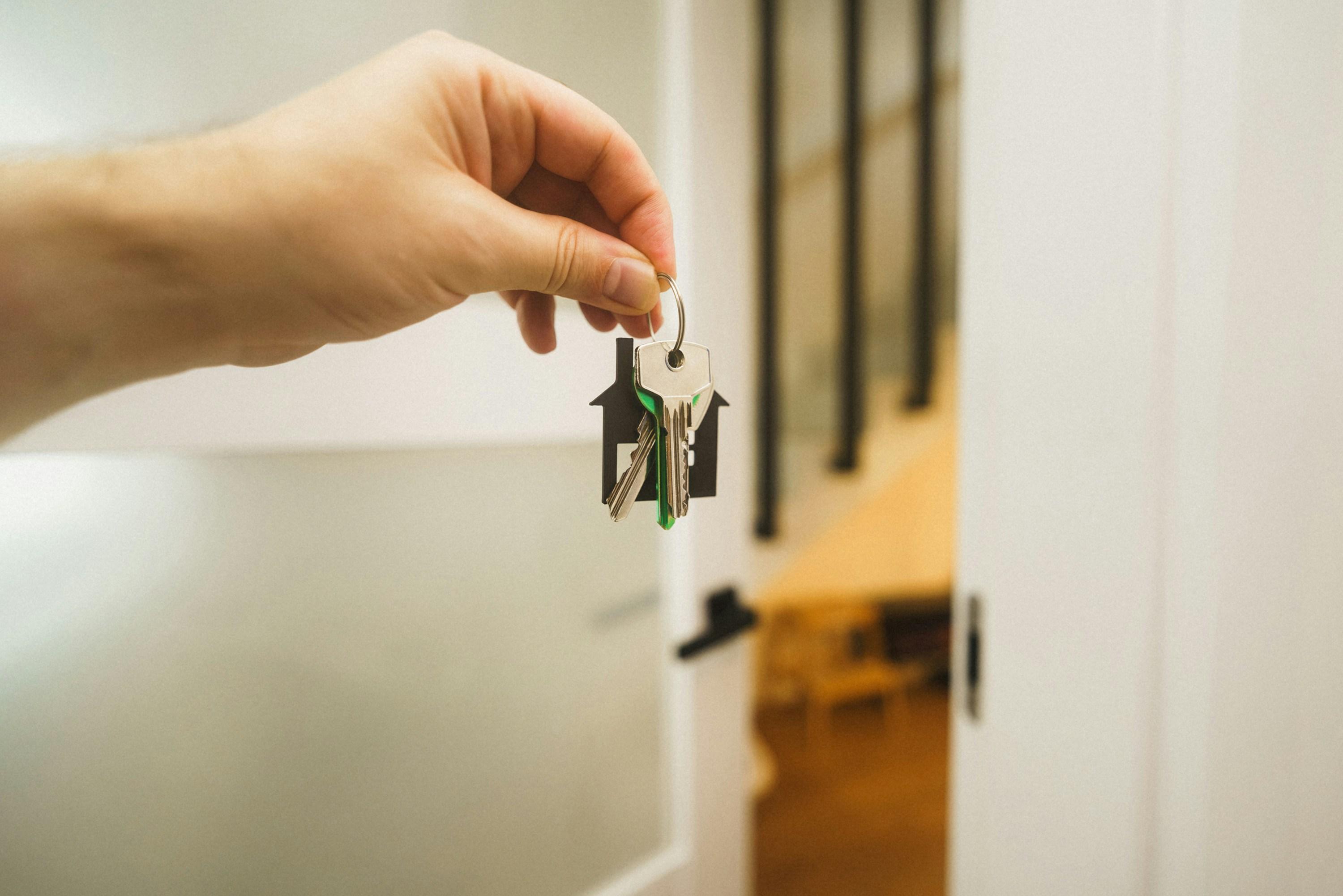 Real estate investor holds keys to property he purchased from a motivated seller.