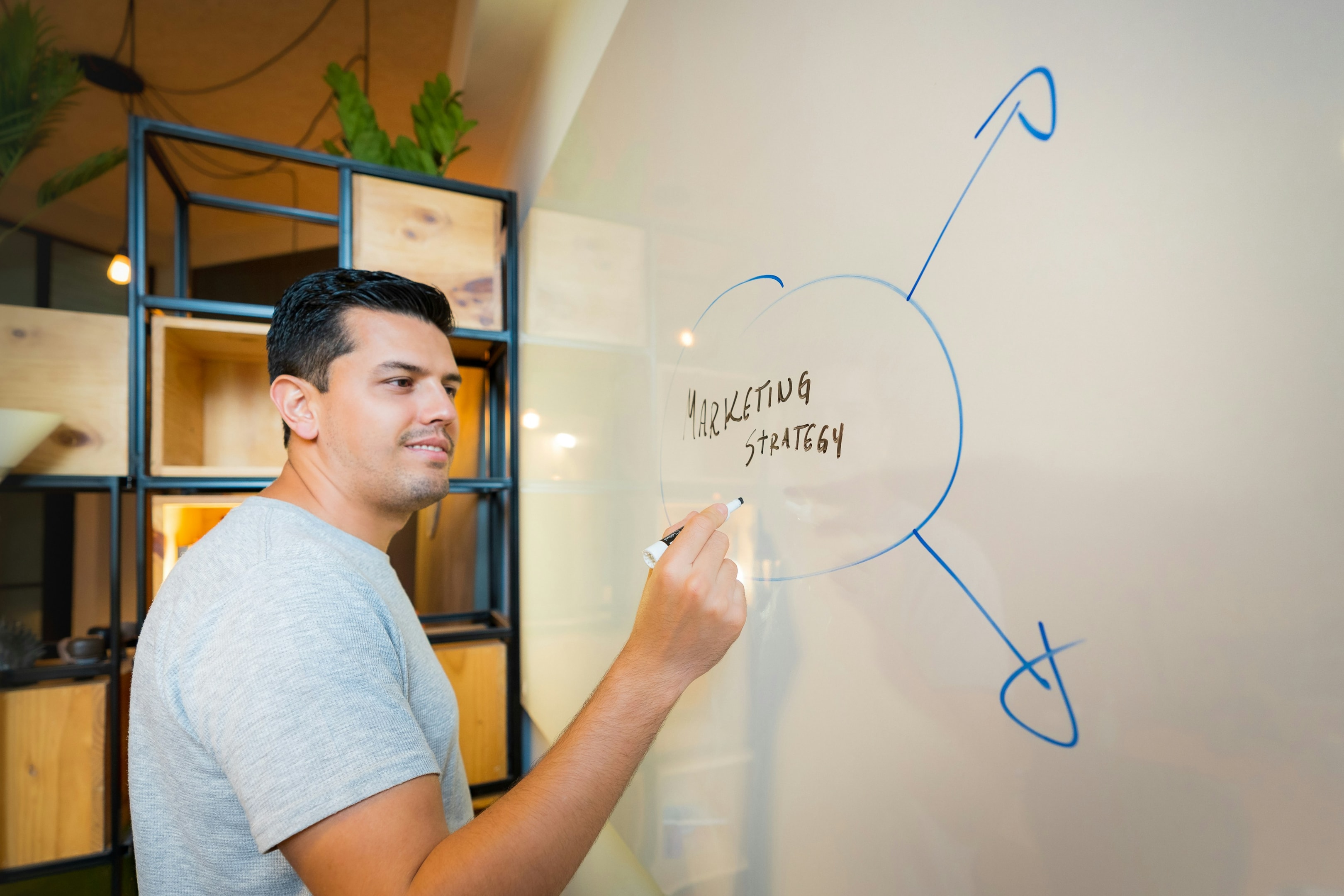 Man writing on whiteboard