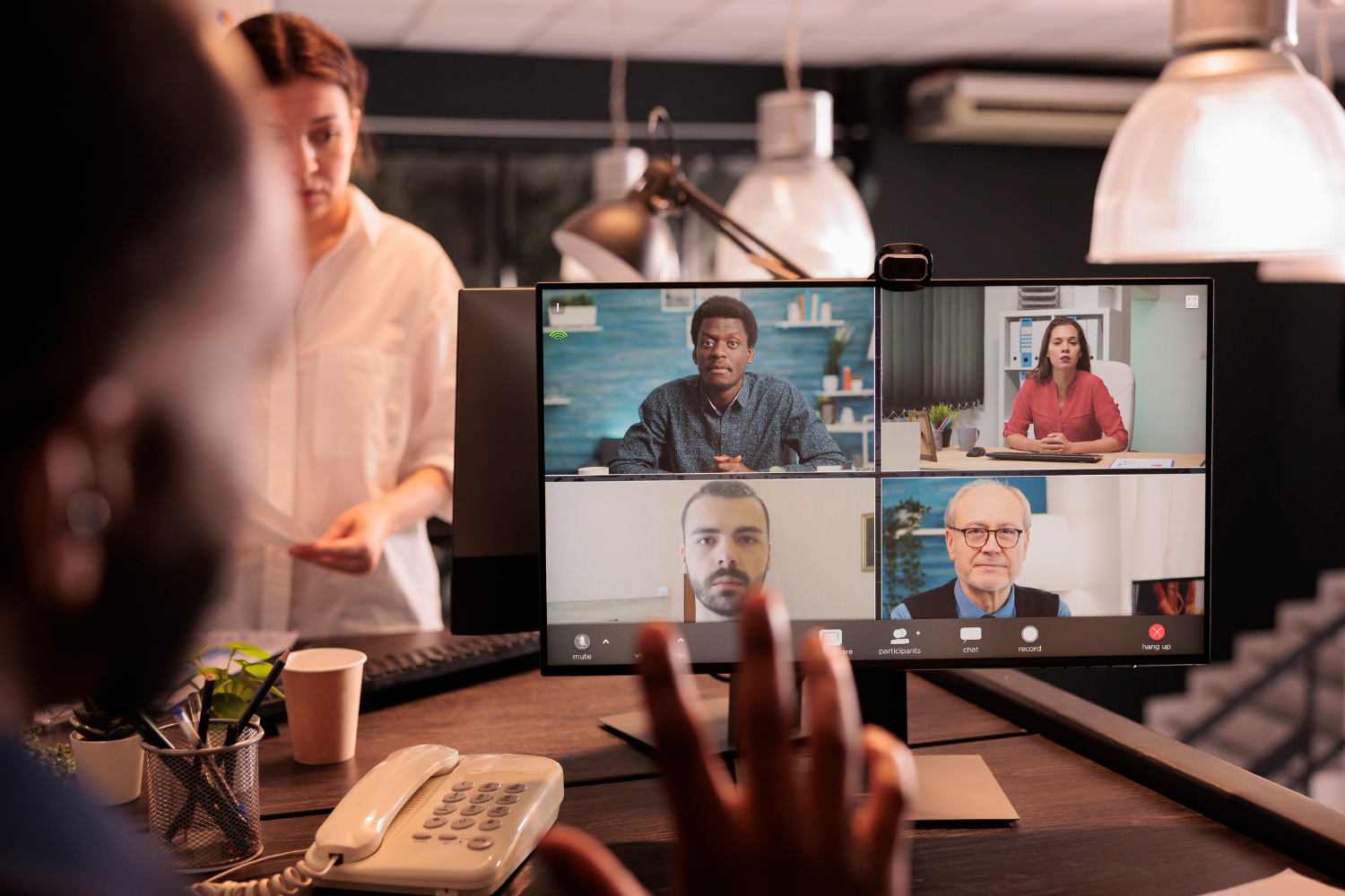Multicultural remote team showing respect through active listening.