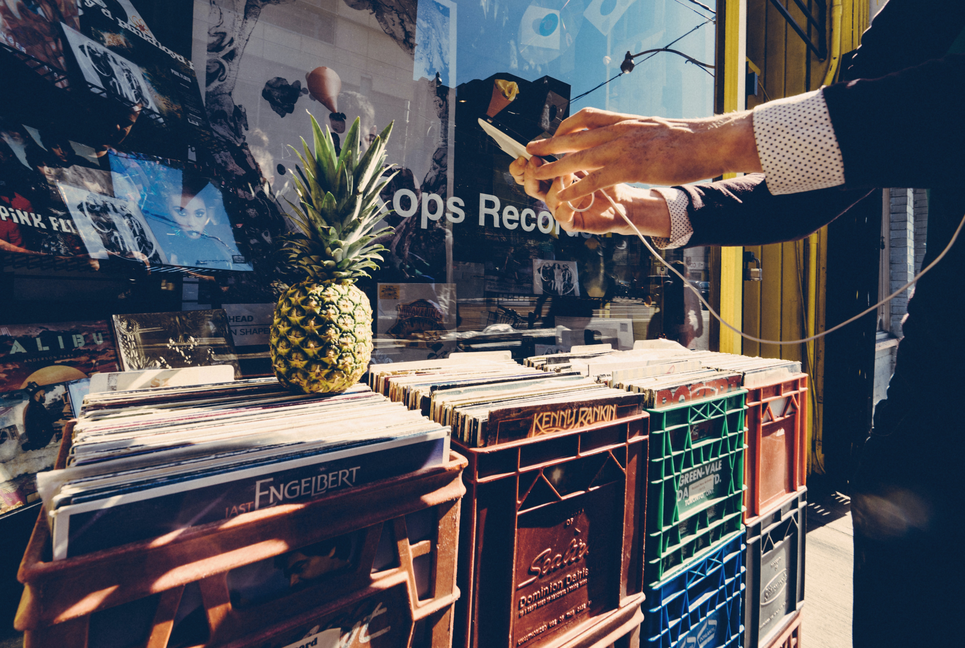 plastic milk crates, vinyl records, record shops