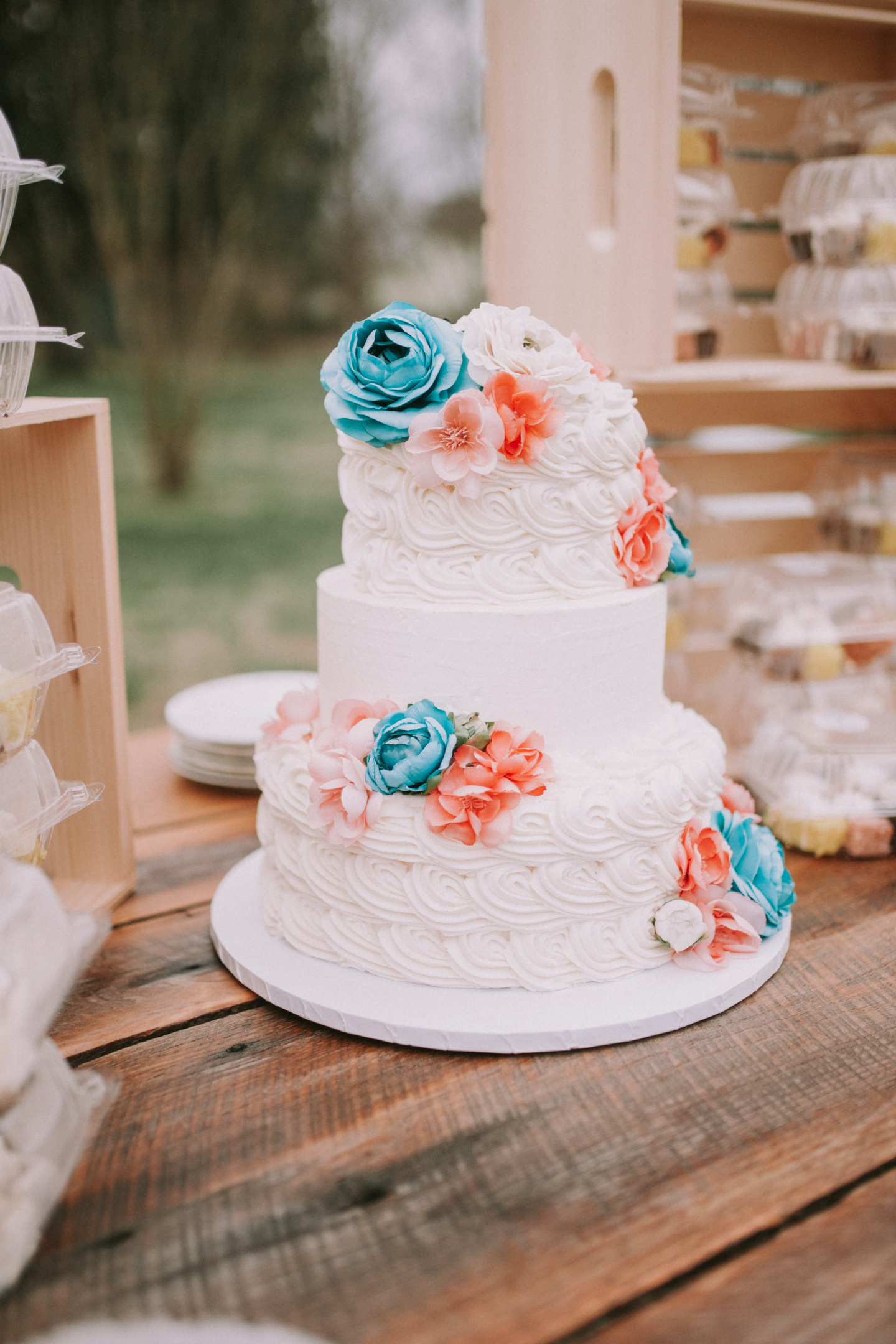 three tier wedding cake with flowers