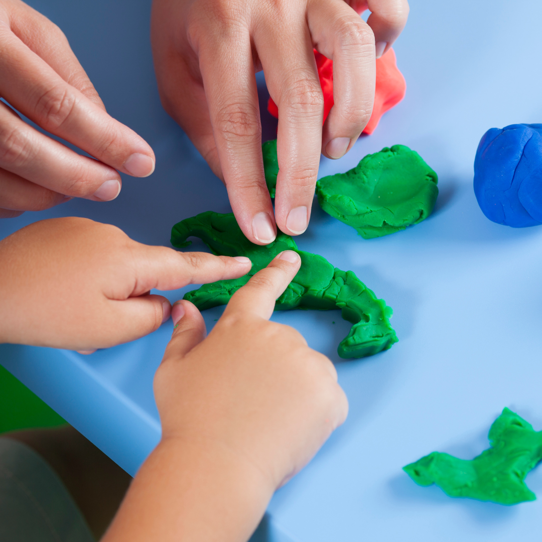 Parent and Child playing with playdough