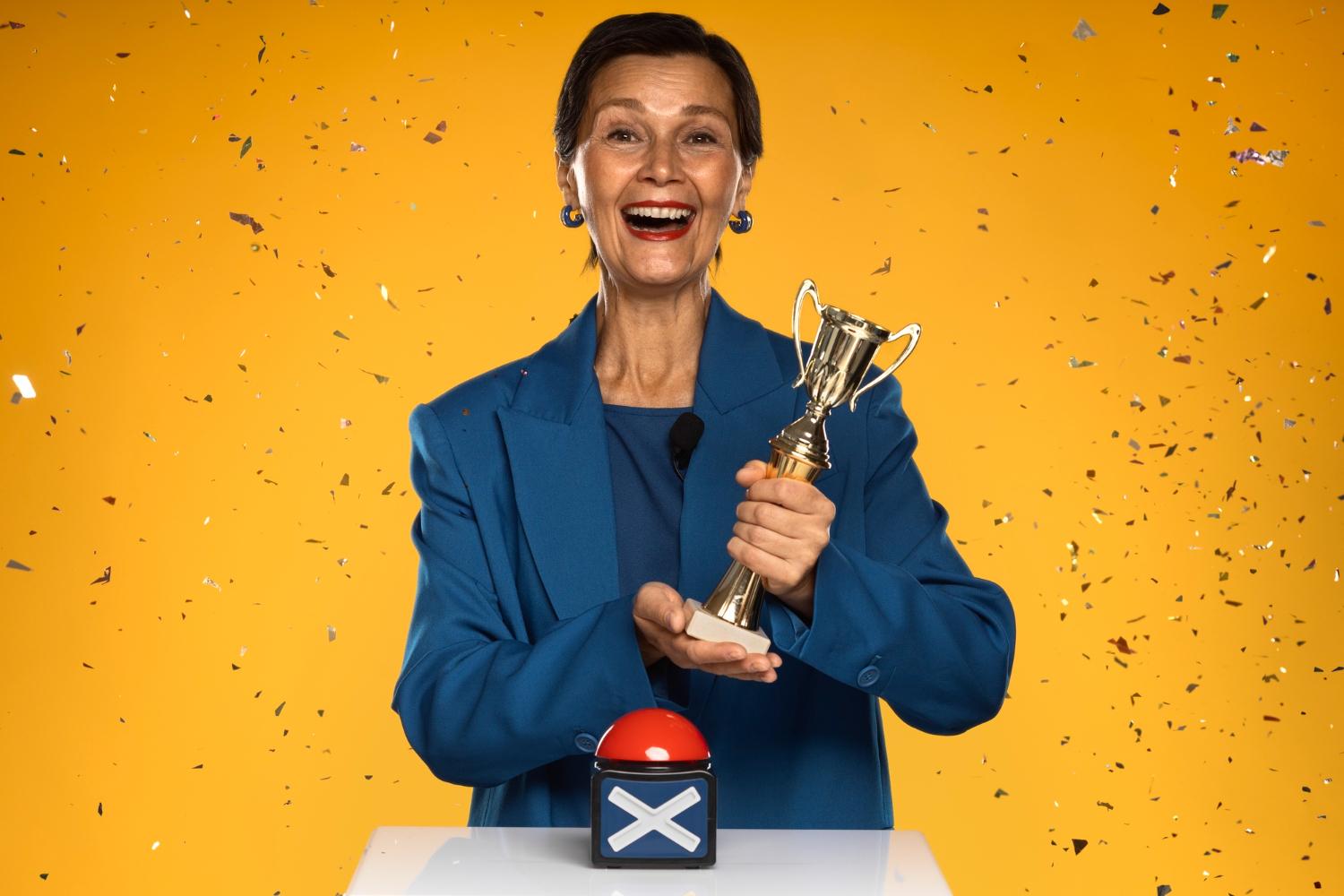 woman crowning a winning product in her store