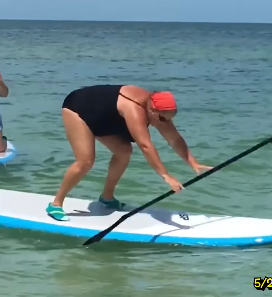 falling off a paddle board