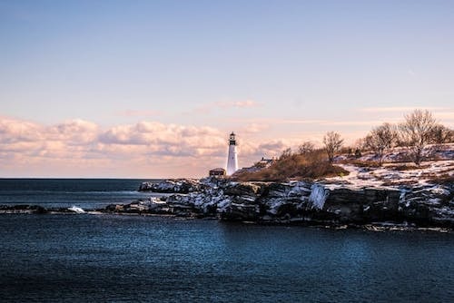 Lighthouse on the coast of Rhode Island during winter in new england