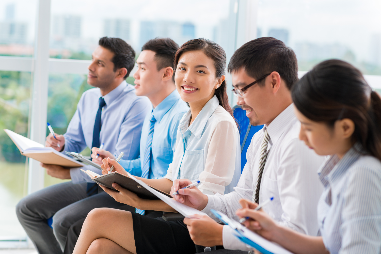 Smiling Filipino employees.