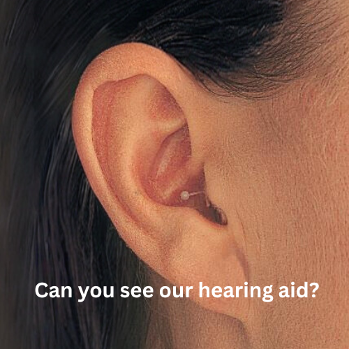 CIC hearing aid discreetly fitted inside ear canal, offering nearly invisible hearing solution for mild to moderate hearing loss