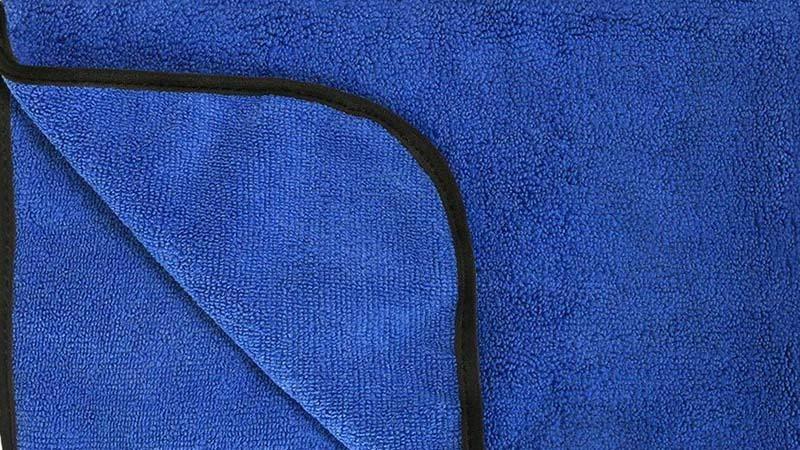 Piped edge microfiber towel