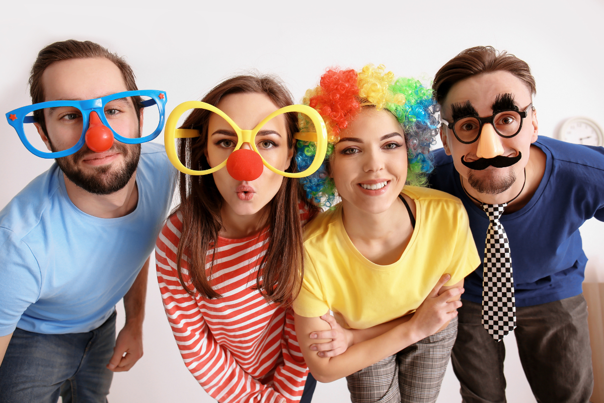 A variety of classic funny Halloween costumes displayed at a costume party.