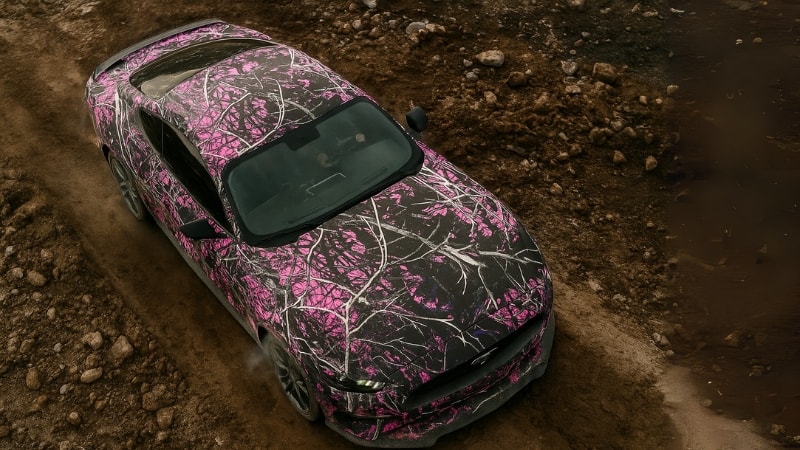 A Mustang wrapped in muddy girl camouflage wrap