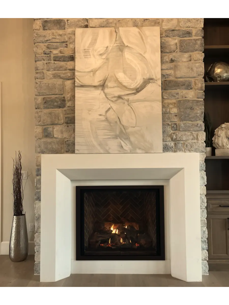 Mantel used to protect heat rising and damaging artwork.