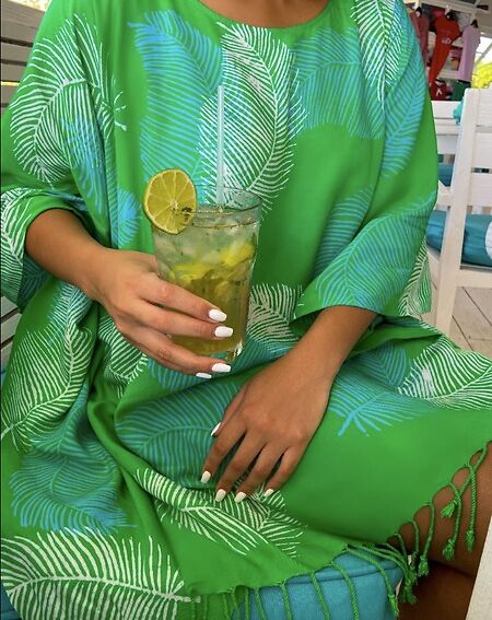 Dressing up for drinks in St Kitts and Nevis, Green Batik Dress, Caribelle Batik