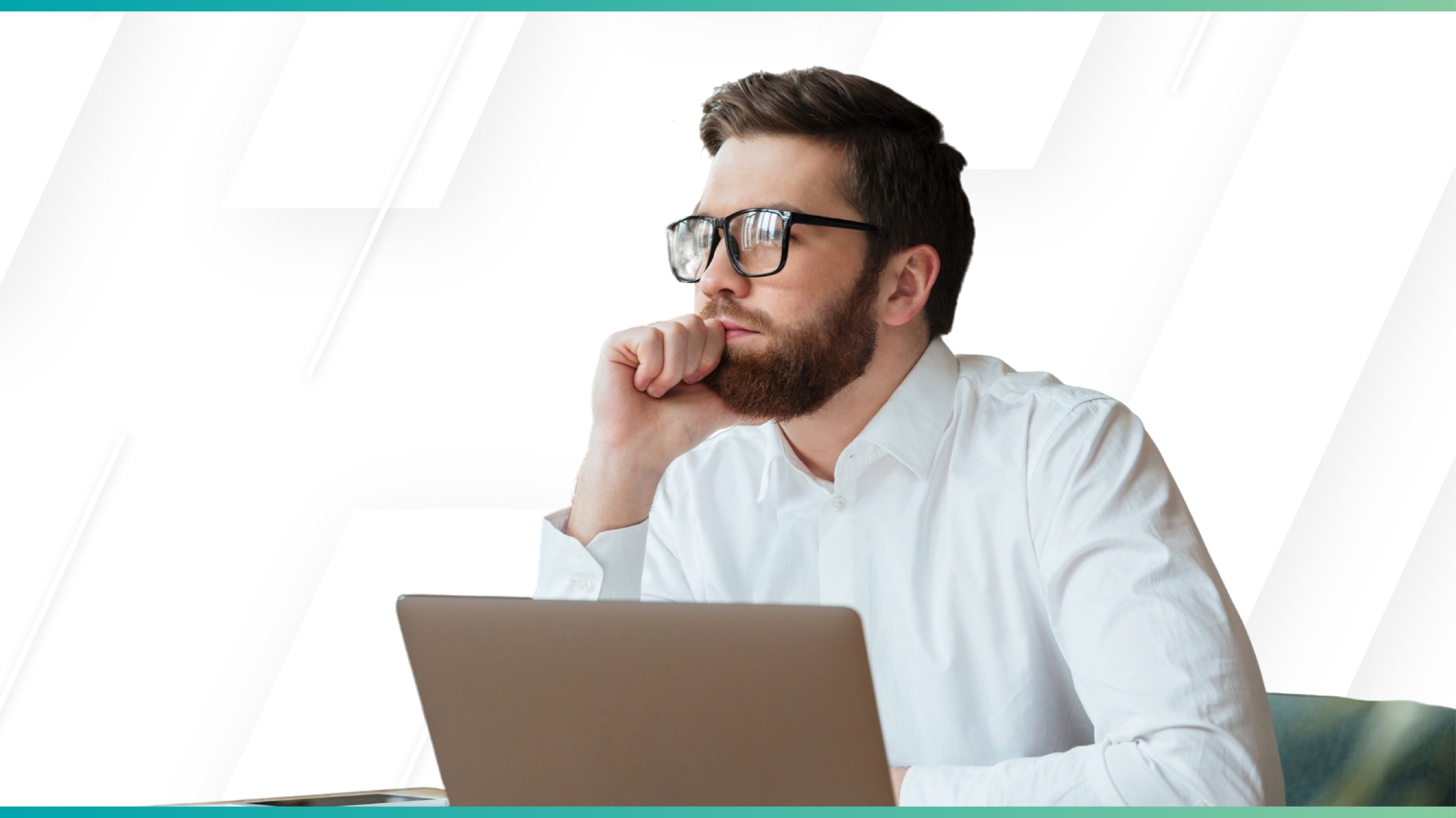 Thoughtful man in glasses and white shirt sitting at a laptop, appearing deep in consideration.