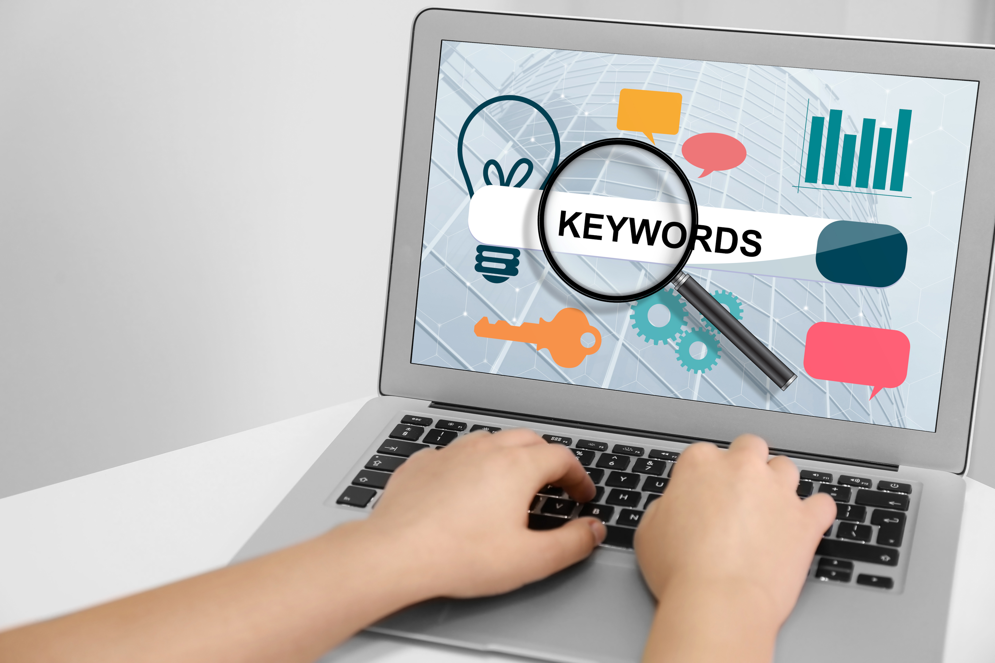 A person using a keyword research tool to find local keywords