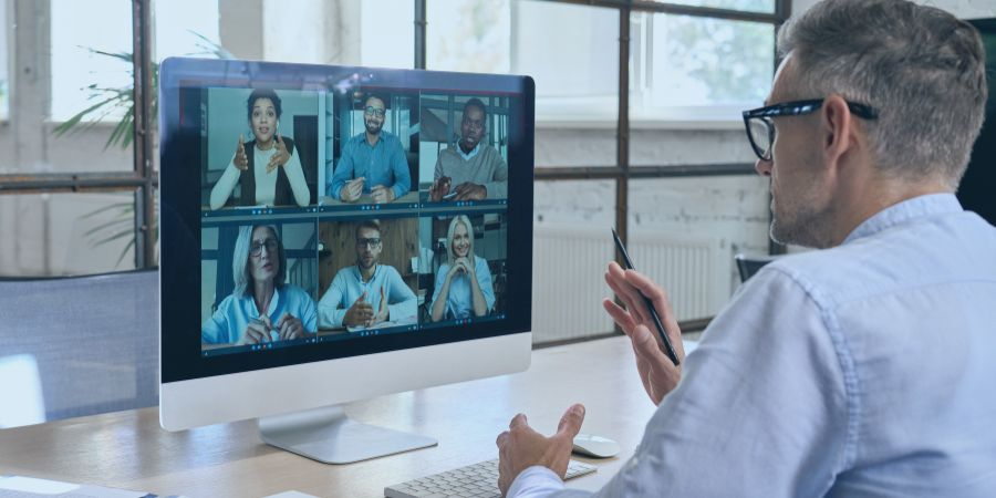 Resilience Manager on video call with his team