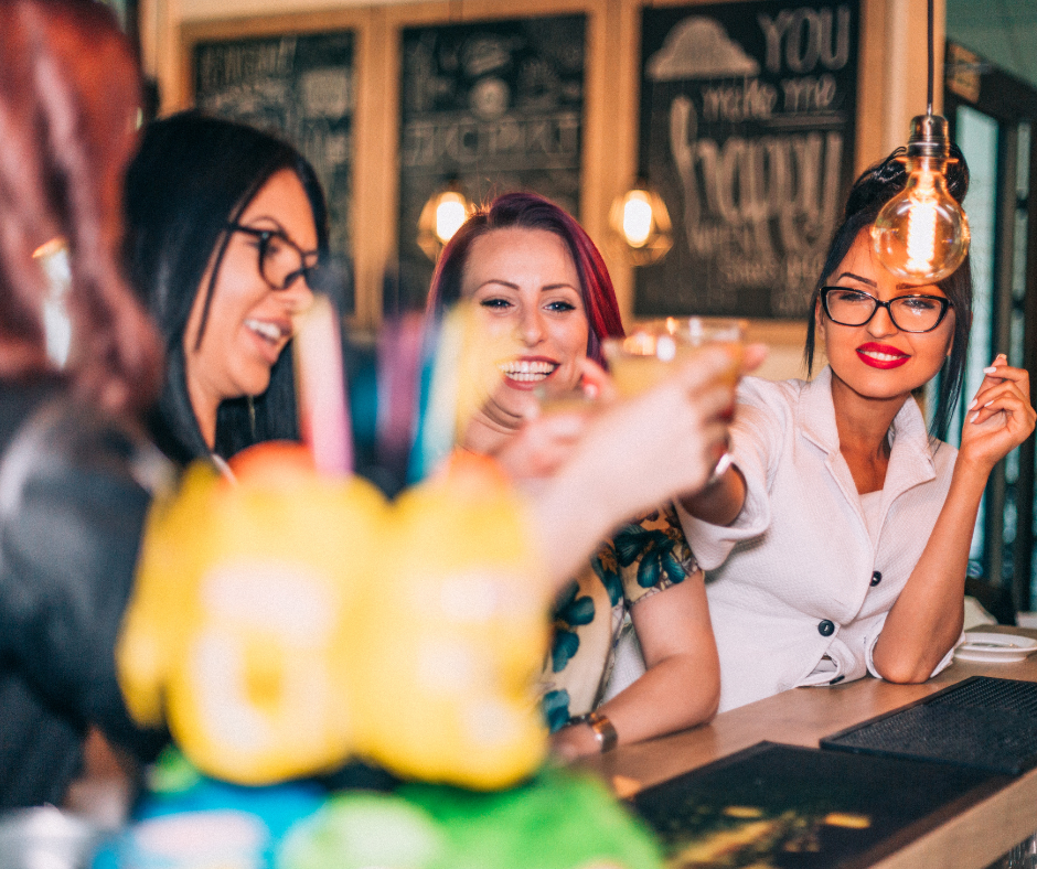 A person enjoying a mocktail in a bar