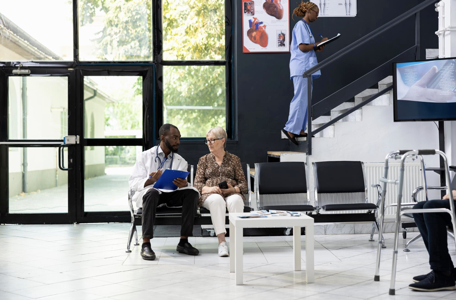 Elderly patient talking to a doctor