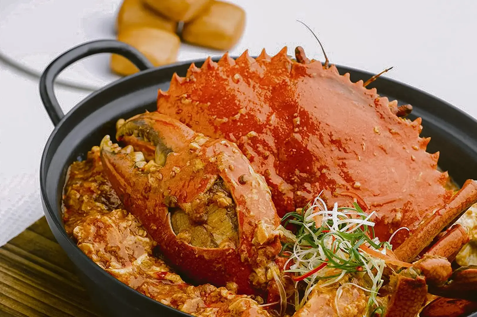 Award-Winning Chilli Crab with sweet, eggy sauce and scallions at JUMBO Seafood
