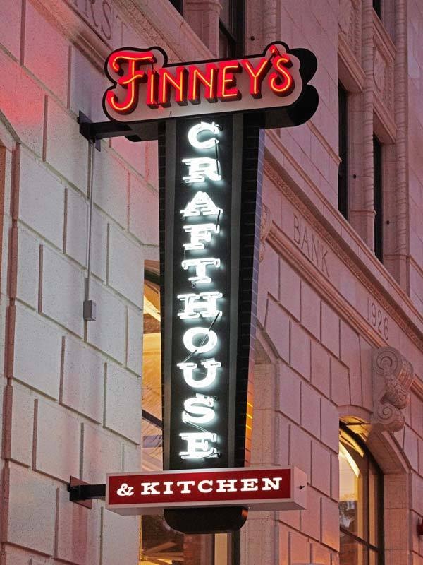 At Dave's Signs, we use the latest technology to showcase your brand. For example, this open face channel letter blade sign that uses both neon and lightbox cabinets makes a statement for all to see downtown.