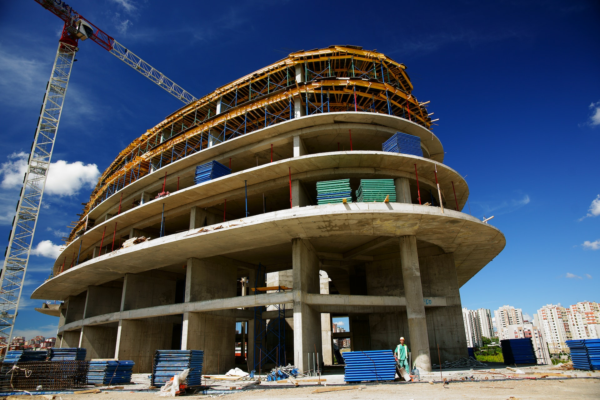 A construction worker wearing a hard hat and safety vest