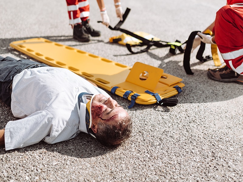 Rescue team preparing spine board