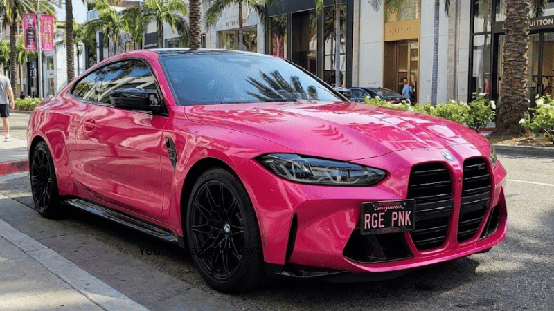 a bmw in Gloss Rouge Pink Vinyl Wrap