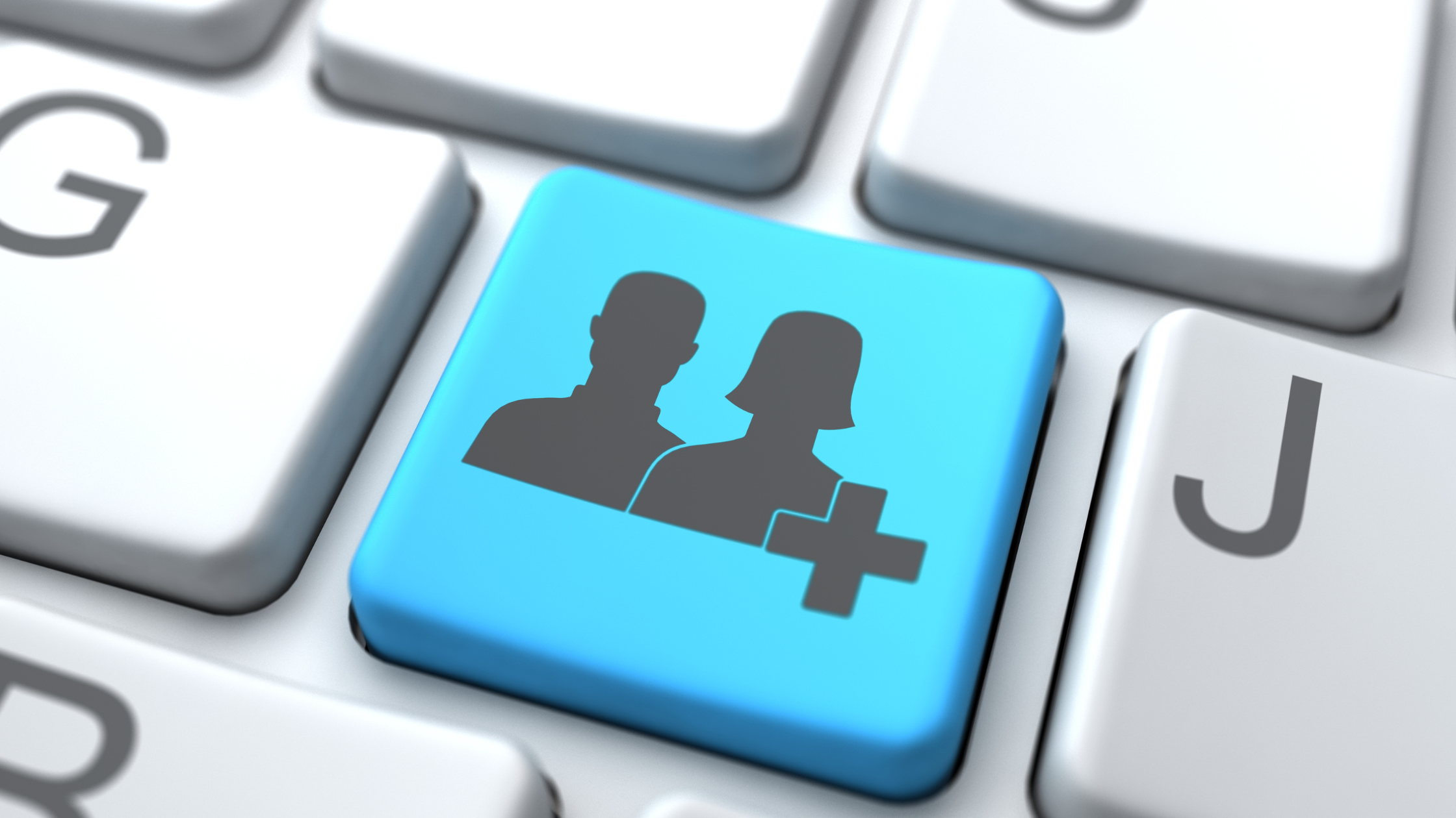 Blue keyboard key with user icons and a plus sign, symbolizing flexible user management with no penalties.