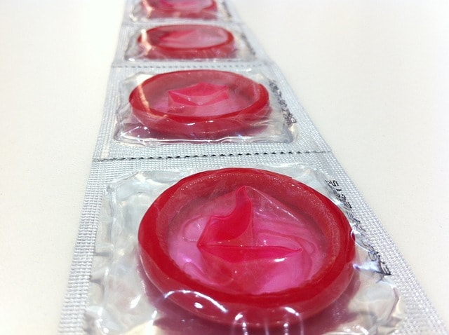 A row of condoms shows the concept of a sex inventory for AA