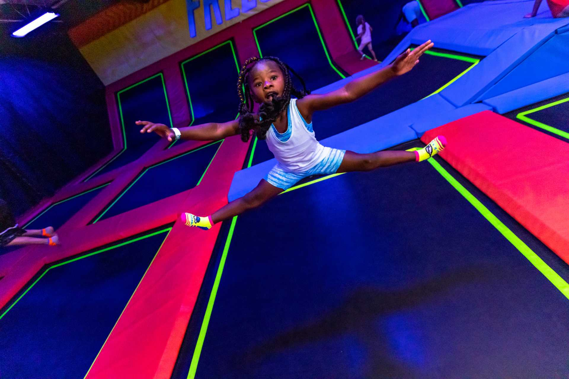 girl jumps on trampolines as part of a basic birthday package