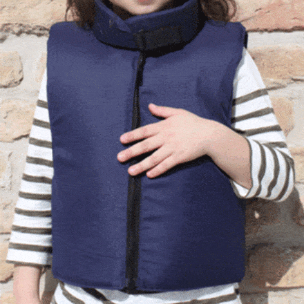 child wearing a navy bulletproof vest