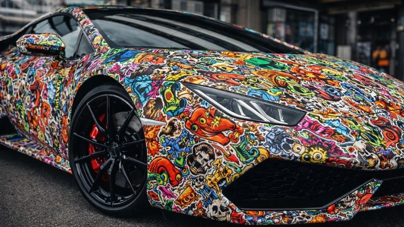A car wrapped in sticker bombed vinyl wrap