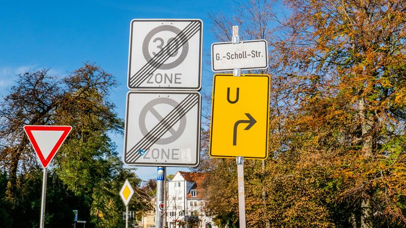 Multiple road signs on the same spot