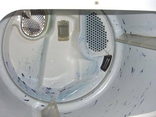 Remove the stains and stuck-on items inside the dryer drum