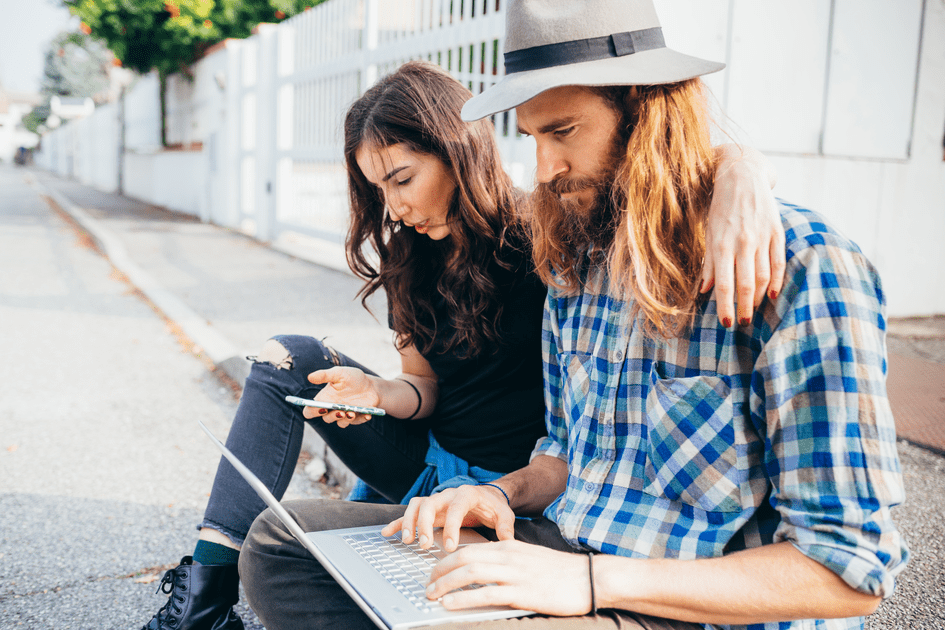 Couple sitting on a bench in New York City, thoughtfully discerning between helpful and unhelpful treatments for their ADHD partner, ensuring they choose the most effective support to strengthen their relationship.