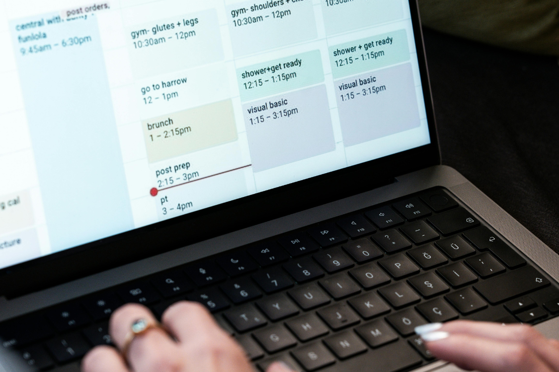 Laptop screen showing a digital work schedule being managed by a remote worker in the Philippines