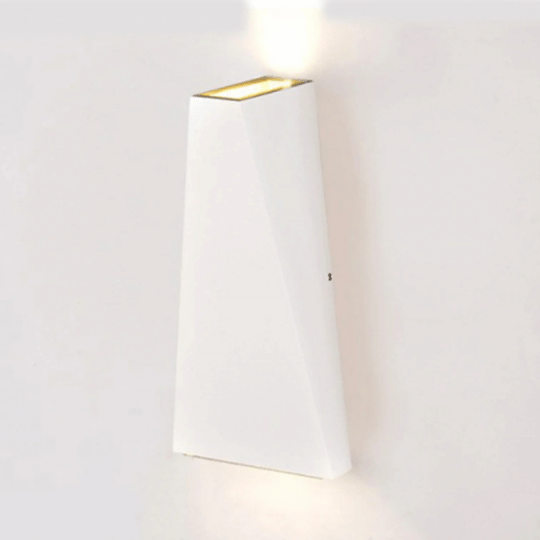 Modern white wall light with a geometric design, emitting soft illumination from both the top and bottom.
