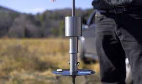 Dynamic Cone Penetrometer (DCP) tester being used in the field