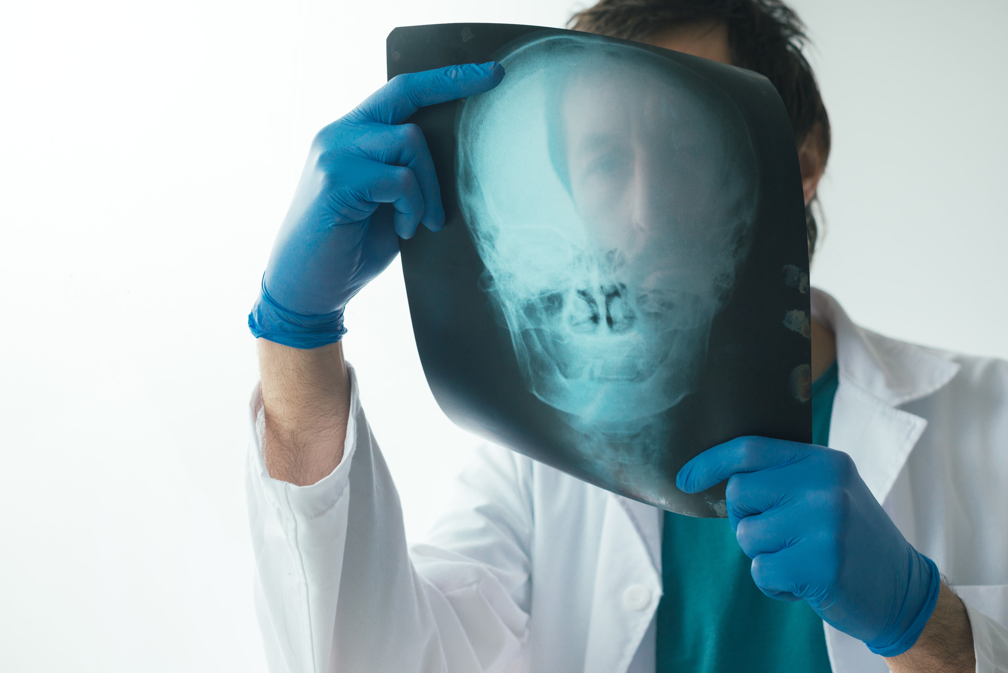 An image of an oral surgeon checking for possible lower jaw surgery.