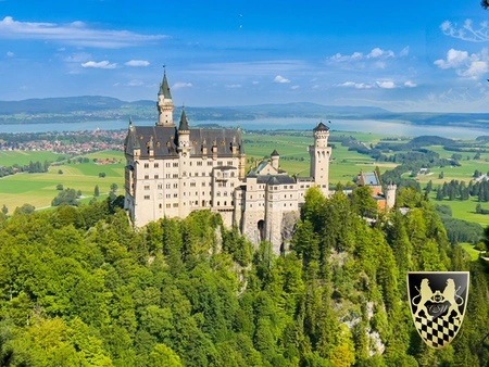 Neuschwanstein Tour Private Driver from Munich 2 A luxurious Mercedes sedan is parked in front of the iconic Neuschwanstein Castle, surrounded by the breathtaking Alpine mountains. This scene captures the essence of a private day trip, perfect for creating incredible memories while exploring awe-inspiring landscapes.