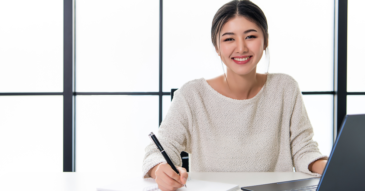 A woman reviewing LLC pass-through taxation options for her OnlyFans business.