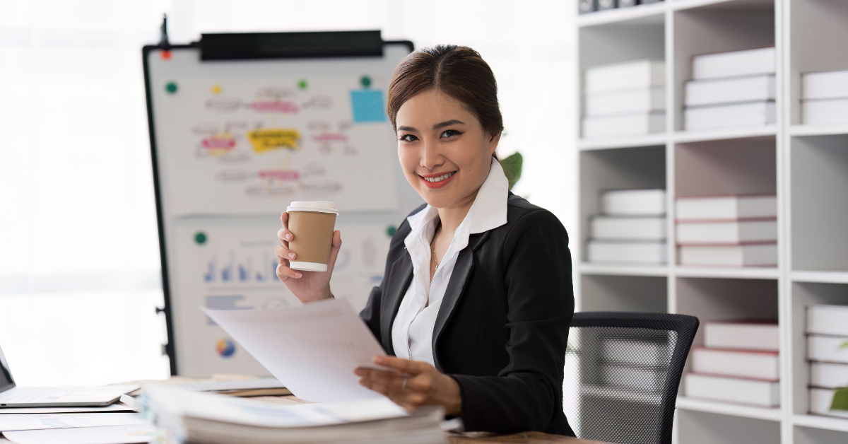 A woman preparing tax return, while learning what is form 8995 on tax returns and tracking business income.