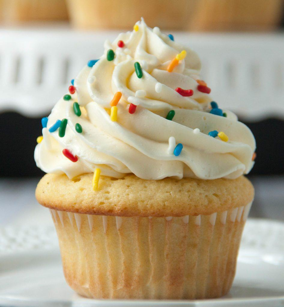 vanilla cupcake topped with Italian meringue buttercream