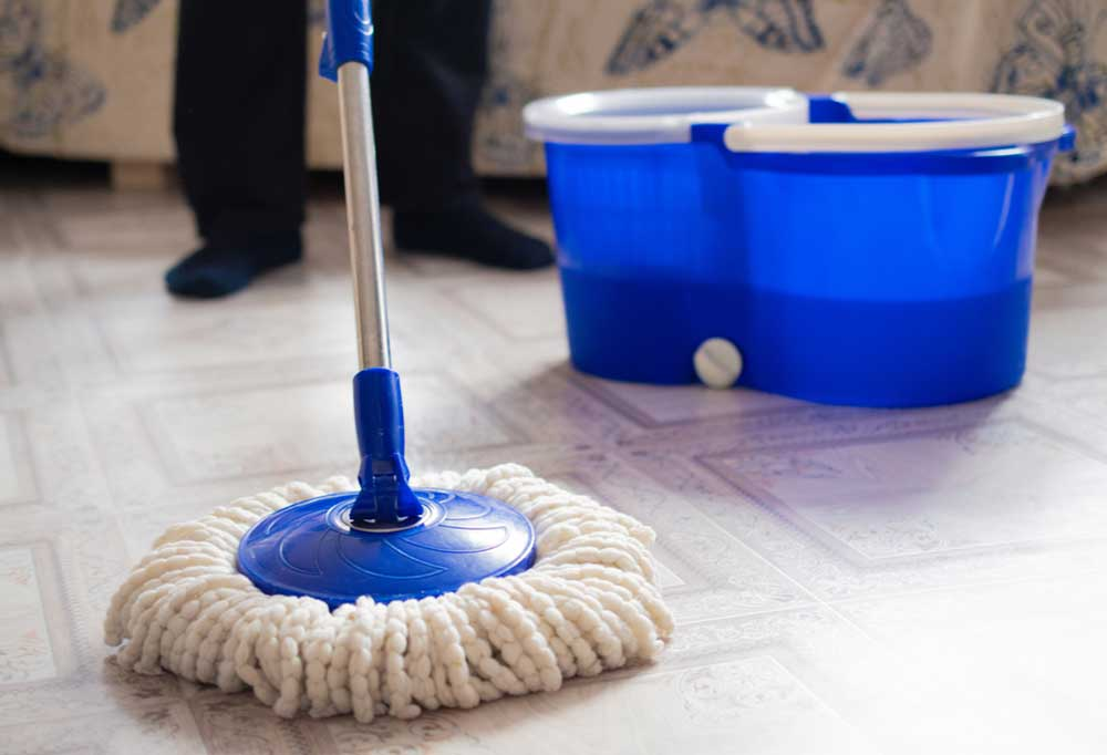 Use a dust mop or clean rag to rinse the linoleum floors