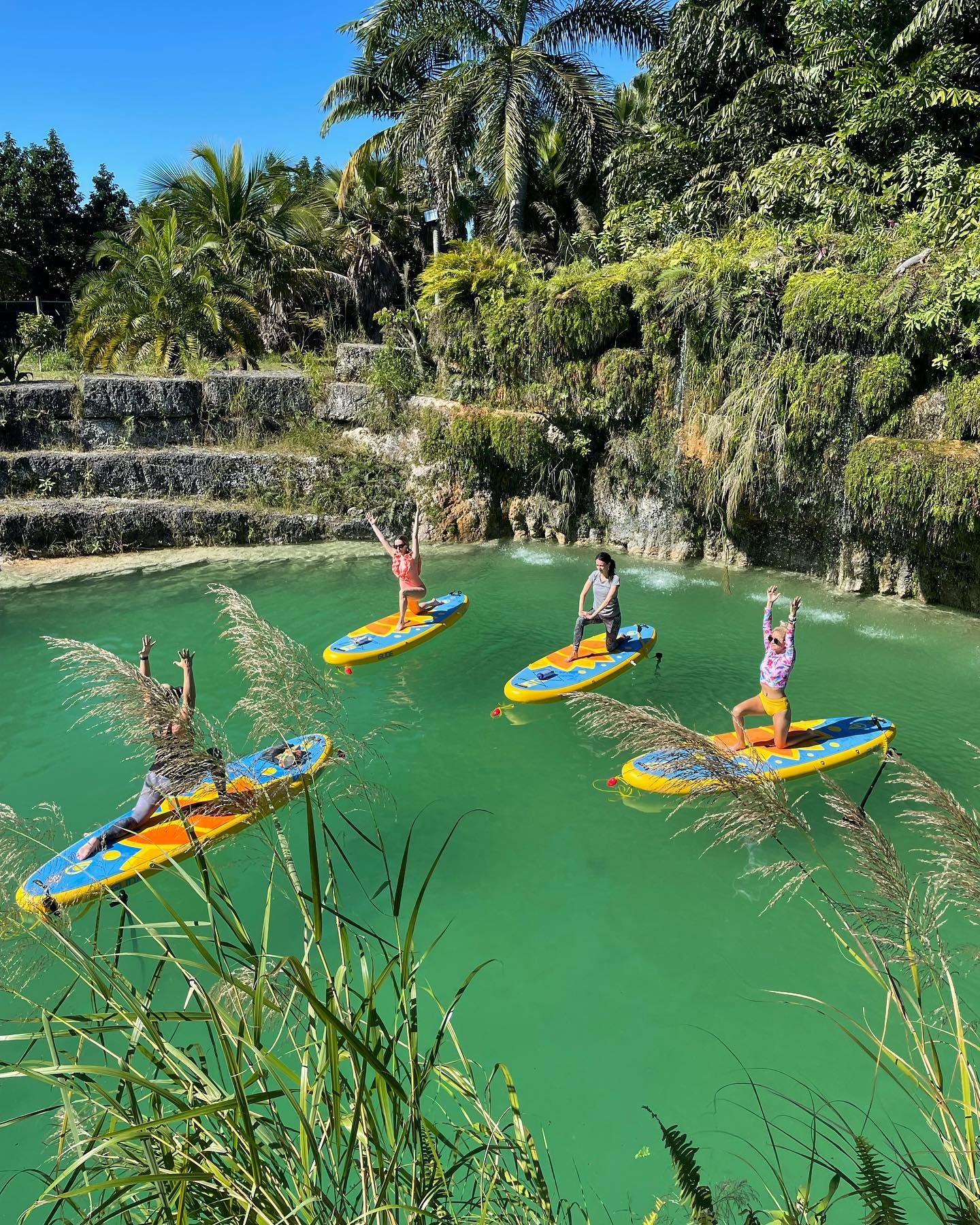 sup yoga on inflatable paddle boards