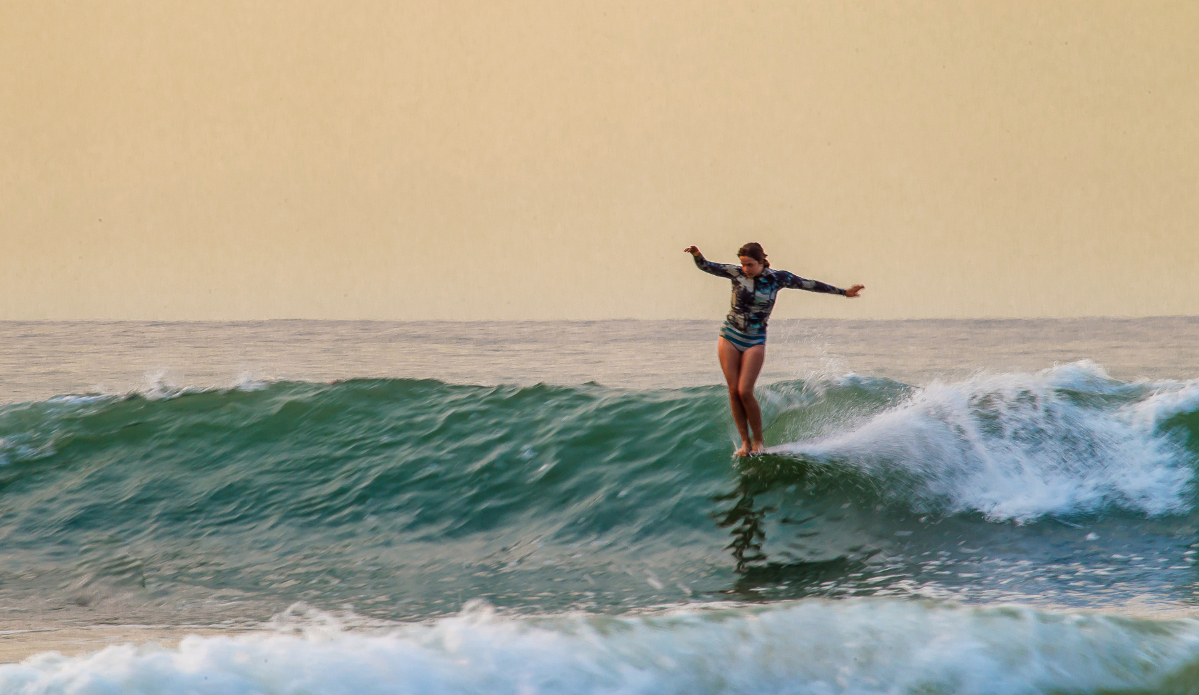 Female Nose Rider at First Point | Source: Surf Sista