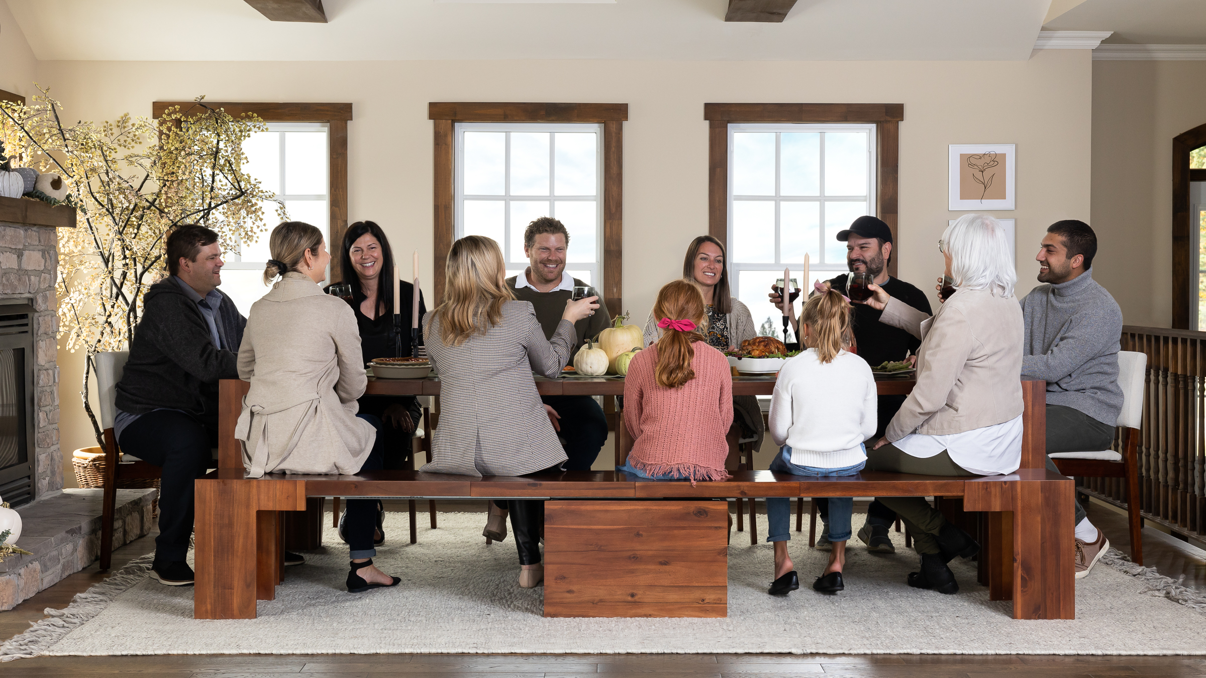 A family sitting at an extendable dining table celebrating Easter.