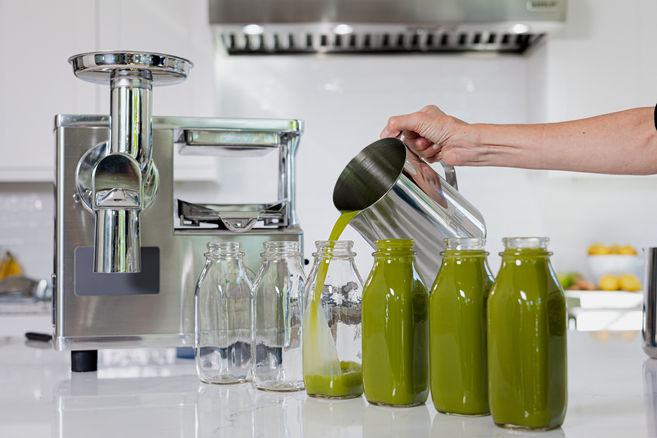 Purify your system with this homemade detox green juice recipe using celery, cucumber, romaine lettuce, apples, lemons, and ginger.