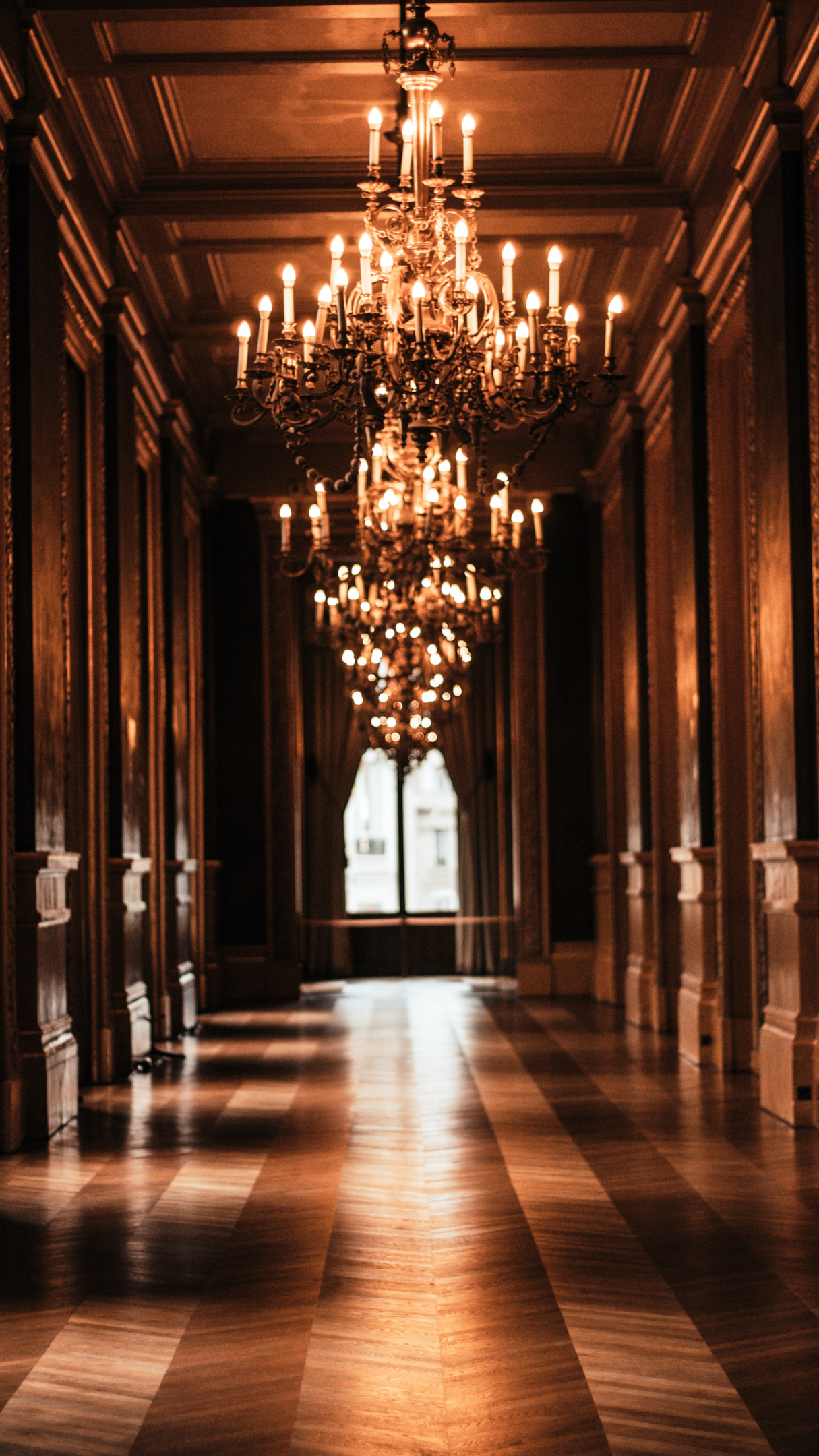 A beautiful chandelier is always a good accent to one's hallway. | Photo from Unsplash